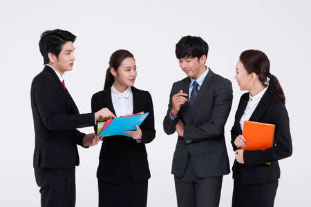 Group of Asian business people working isolated on white