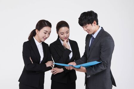 Group of Asian business people with file isolated on whiteの写真素材