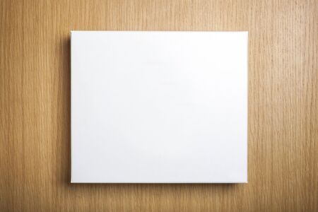 White box on wooden tableの写真素材