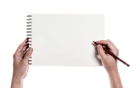 Hand writing on drawing book isolated on whiteの写真素材
