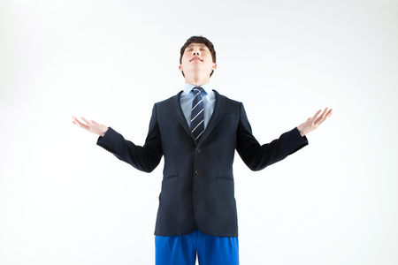 Asian man feel freedom isolate on whiteの写真素材