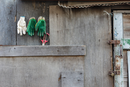 Shot of an old house gate and wallの写真素材