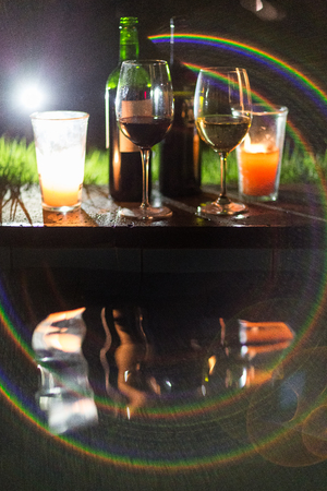 Wine bottles and glasses,wine and cocktailの写真素材