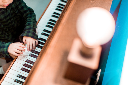 cute little boy, to play the pianoの写真素材