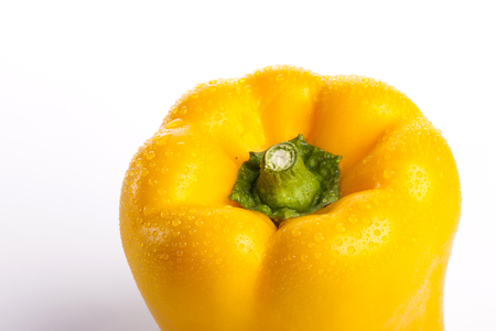 A ripe yellow paprika isolated on white backgroundの写真素材
