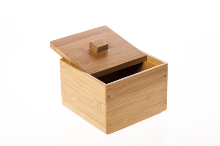 A brown wooden box isolated on white backgroundの写真素材