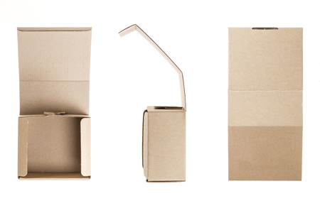 Three brown cardboard boxes on white backgroundの写真素材