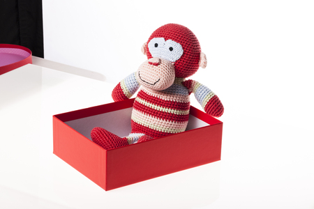 A red Christmas present box isolated on white backgroundの写真素材