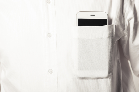 A smartphone in a pocketの写真素材