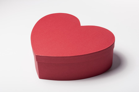 A red heart shaped box isolated on white backgroundの写真素材