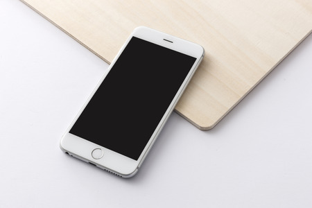 A smartphone on a woodの写真素材
