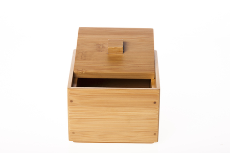 A brown wooden box isolated on white backgroundの写真素材