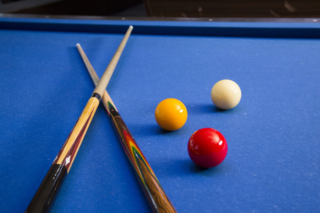 Play billiards on the pool table. 059