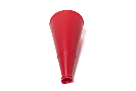 A red plastic megaphone isolated on white backgroundの写真素材