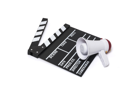 A film slate and a megaphone isolated on white backgroundの写真素材