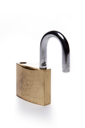 A metal lock isolated on white background is unlocked.の写真素材