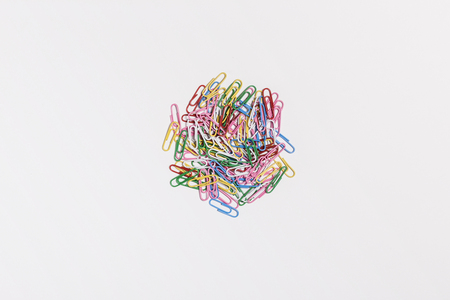 Colorful paper clips on white backgroundの写真素材