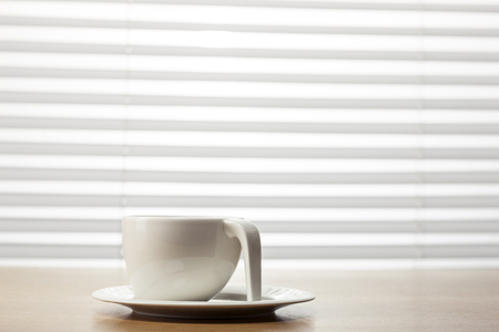 A white cup of coffee isolated on white backgroundの写真素材