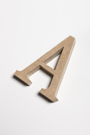 A wooden alphabet letter A isolated on white backgroundの写真素材