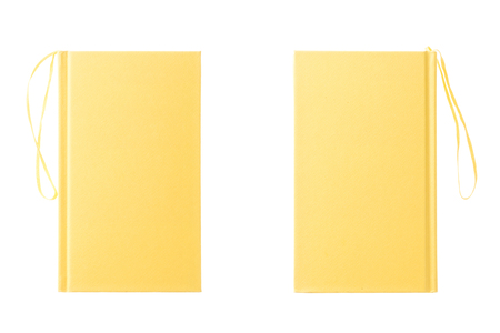 Two yellow books on white backgroundの写真素材