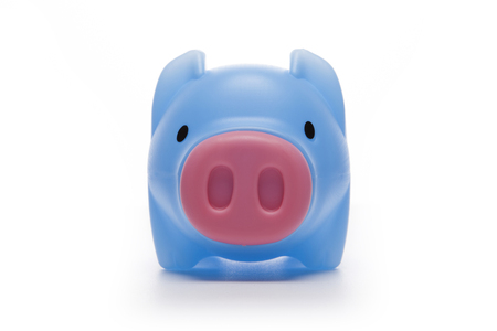 A blue piggy bank isolated on white backgroundの写真素材