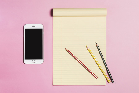 Business objects on pink backgroundの写真素材