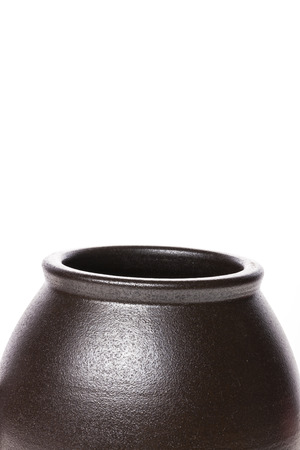 A brown ceramics kettle isolated on white backgroundの写真素材