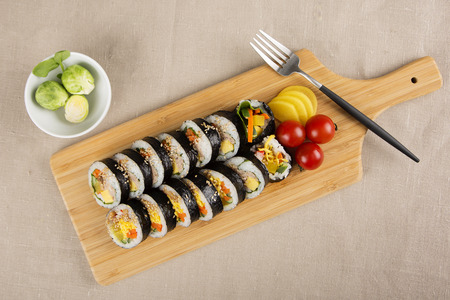 Food photo - famous snack and street foods in Korea. Stir-fried rice cake, Korean sausage, Kimbap, Ramen, Dumplings and cold bean-soup noodles.の写真素材