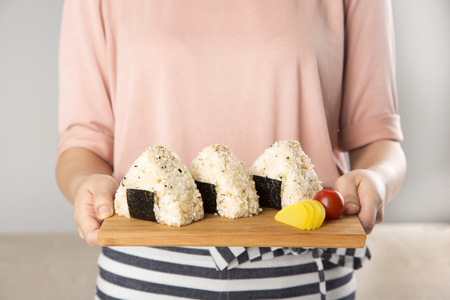 Food photo - famous snack and street foods in Korea. Stir-fried rice cake, Korean sausage, Kimbap, Ramen, Dumplings and cold bean-soup noodles.の写真素材