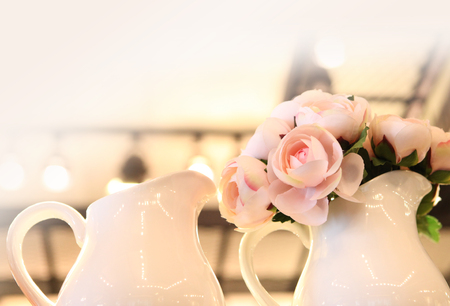 White flowers in white jugの写真素材