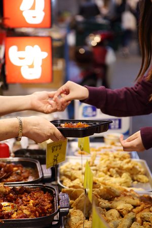 In Korean traditional market selling variety of the products such as foods are sold fresh.の写真素材