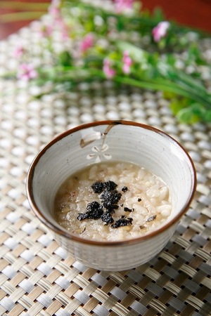 Korean food collection photo_Abalone White rice in bowl top view Porridge, delicious abalone soup 4の写真素材