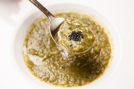 Korean food collection photo_Seaweed fulvescens Porridge, bowl is filled with dark green soup 8の写真素材