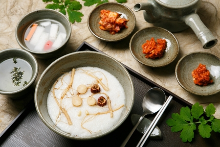 Korean food collection photo_Ginseng White rice in bowl top view Porridge, white soup made of ginseng its good for healthy 1の写真素材