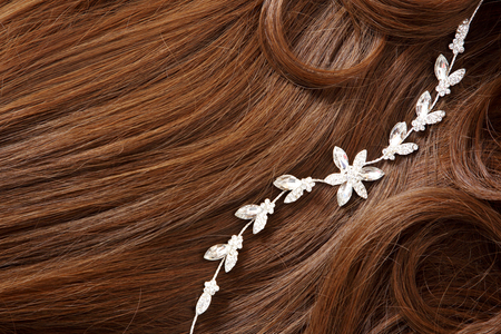 Long colourful hair with objects related to a hair salon on close upの写真素材