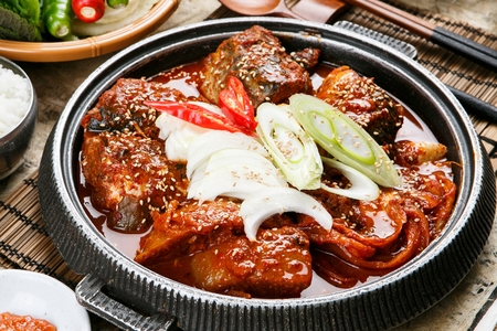 Korean braised mackerel with radish in a potの写真素材