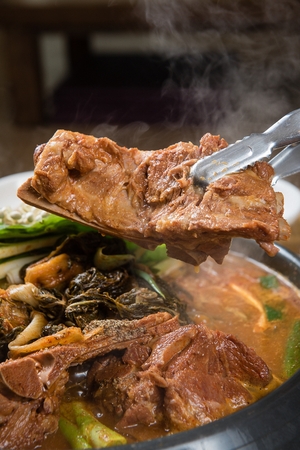 Korean cuisine Gamja Tang, spicy pork back-bone stew with cabbageの写真素材