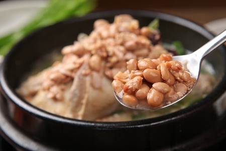 Korean ginseng chicken soup cooked in fast-fermented bean paste, Samgaetangの写真素材