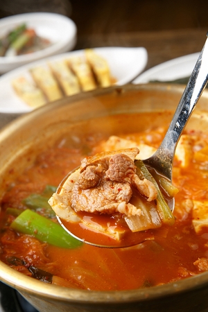 Spicy kimchi stew with pork, famous Korean cuisine Kimchi Jjigaeの写真素材