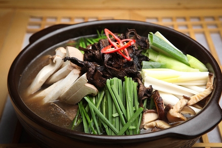 Korean cuisine chicken baeksuk, boiled chicken soup with Korean medicinal herbsの写真素材