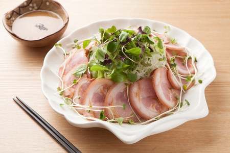 Korean cuisine naengche jokbal, boiled pigs' feet served with cold vegetablesの写真素材