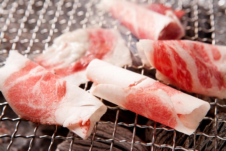 Korean barbecue, beef brisket on grillの写真素材