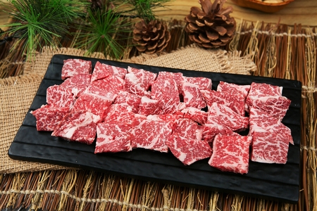 Korean barbecue, assorted beef parts on black plateの写真素材
