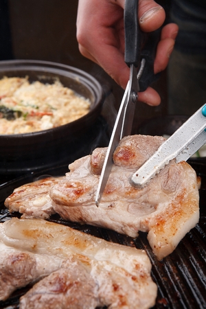 Korean barbecue Moksal, grilled pork neckの写真素材