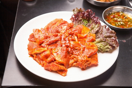 Korean barbecue Samgyeopsal, red pepper paste-marinated pork bellyの写真素材
