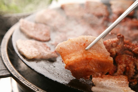 Stir-fried webfoot octopus and pork bellyの写真素材