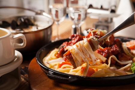 Korean Buldak spaghetti, hot and spicy cream chicken pastaの写真素材