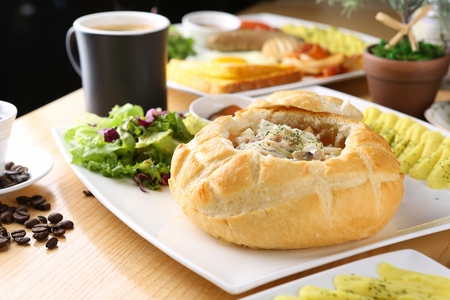 Pane pasta with cream sauce in bread