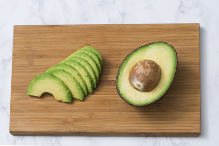 Stock Photo - fresh, ripe avocado, the healthiest fruits. making salad, smoothie, oil by avocado....