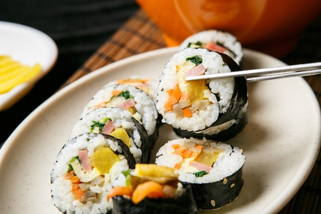 Korean food Kimbap, seaweed-rolled rice and toppingsの写真素材